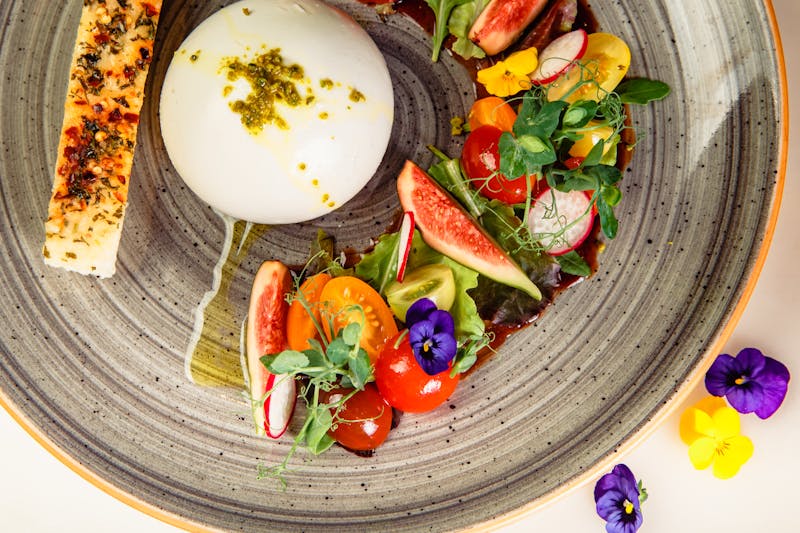 Caprese salad with fresh mozzarella and tomatoes